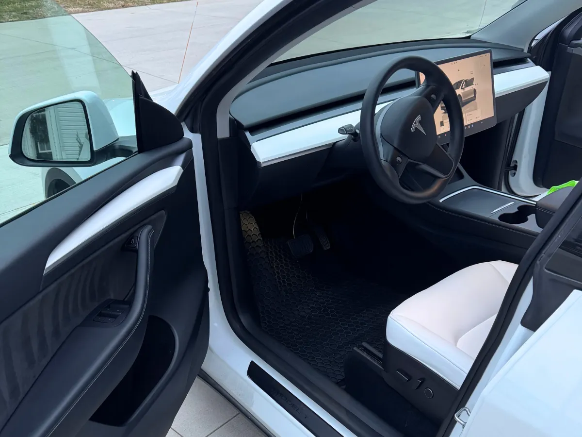Spotless white Tesla interior after a mobile interior detail in Cleveland